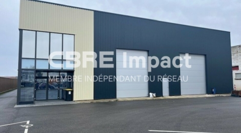 Local d'activité d'une surface d'environ 1 300 m². : Photo